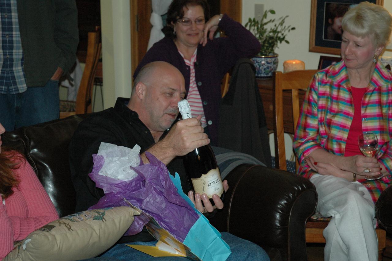 Opening presents at Randy Coggeshell's 50th birthday