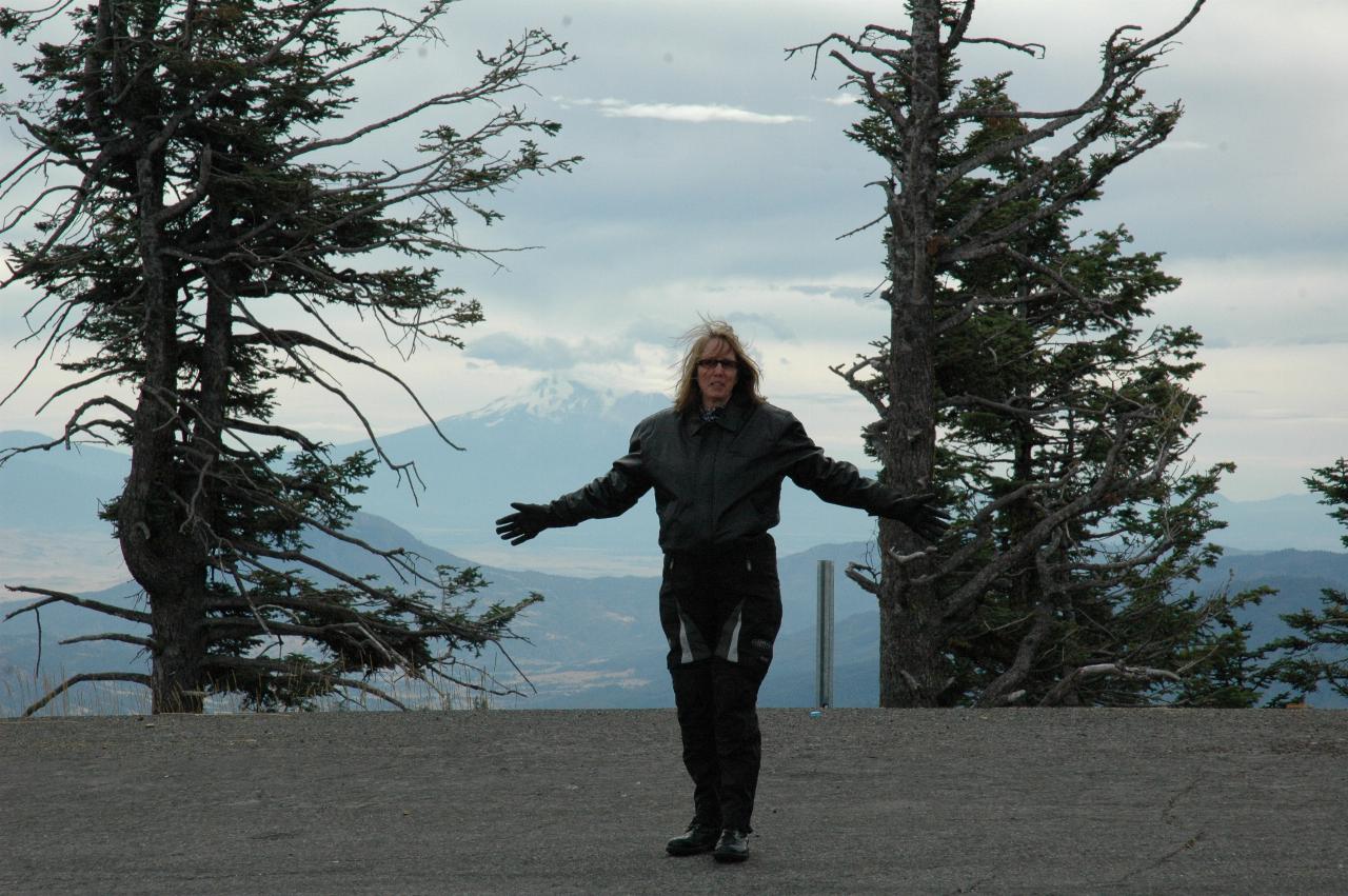 Marilyn in her riding gear in front of Mt. Shasta, as seen from Mt. Ashland