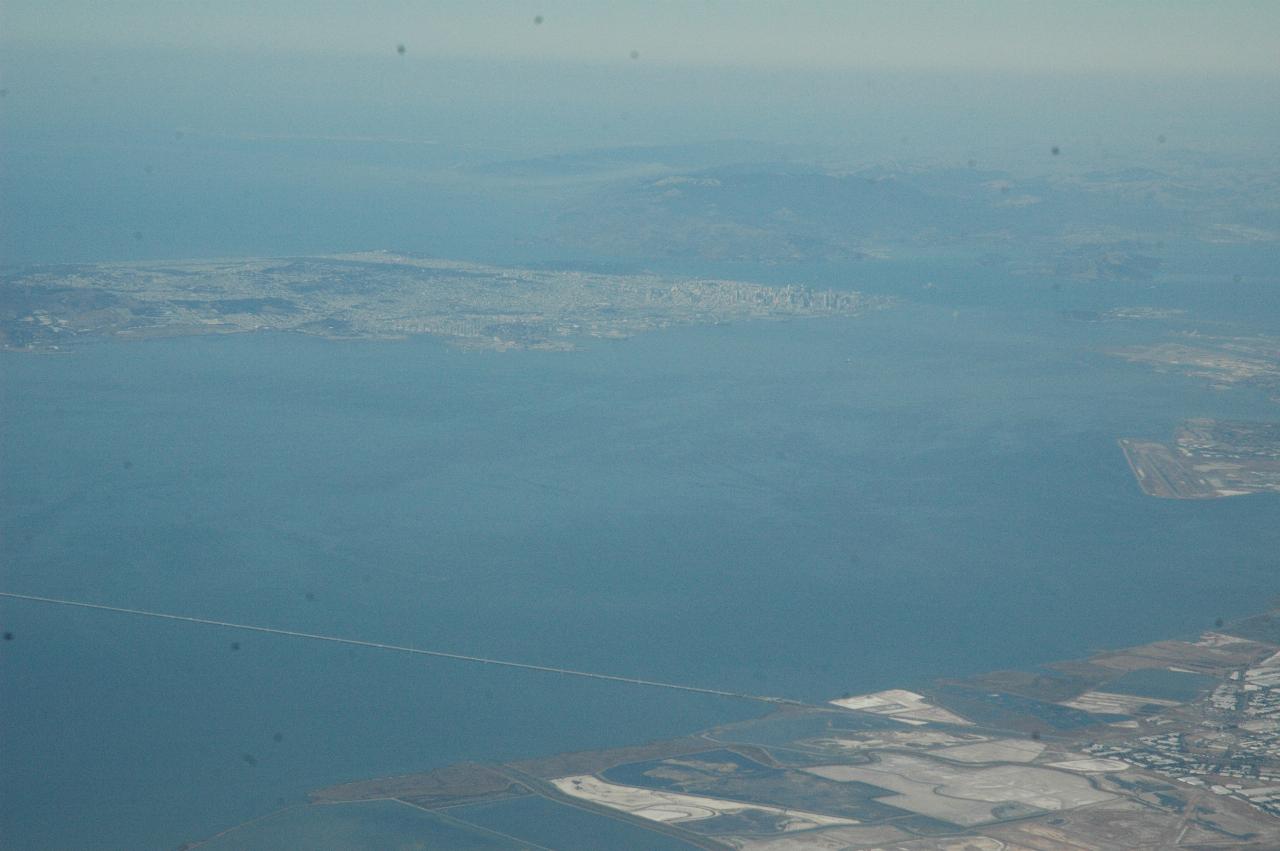 San Francisco bay, as seen from flight from San Jose to Seattle, from south end of Bay showing San Mateo Bridge at bottom