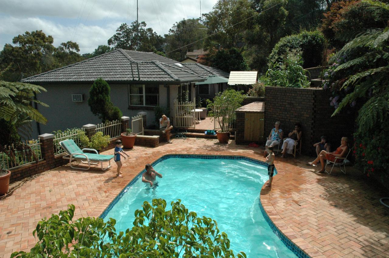 Currey's pool during Nat's farewell before return to London: (l->r): Gilbert, Yvonne, Cecelie, Peter and Kelly, with Cameron in pool with Tynan, and Jake poised to jump in.