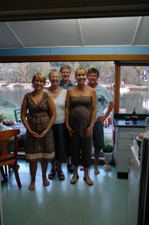 Family photo in Woronora kitchen after Christmas Eve Mass; Michellle, Yvonne, Peter, Kelly and Cameron