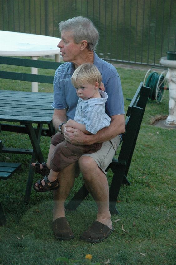 Father and grandchild: Peter and Flynn at Crofts' after Christmas Eve Mass