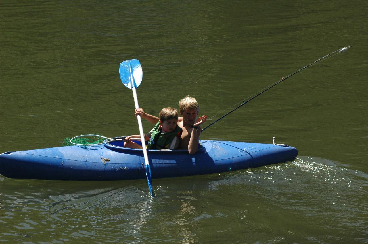 Dylan fishing, and taking Jake for a ride on Woronora River, Christmas morning