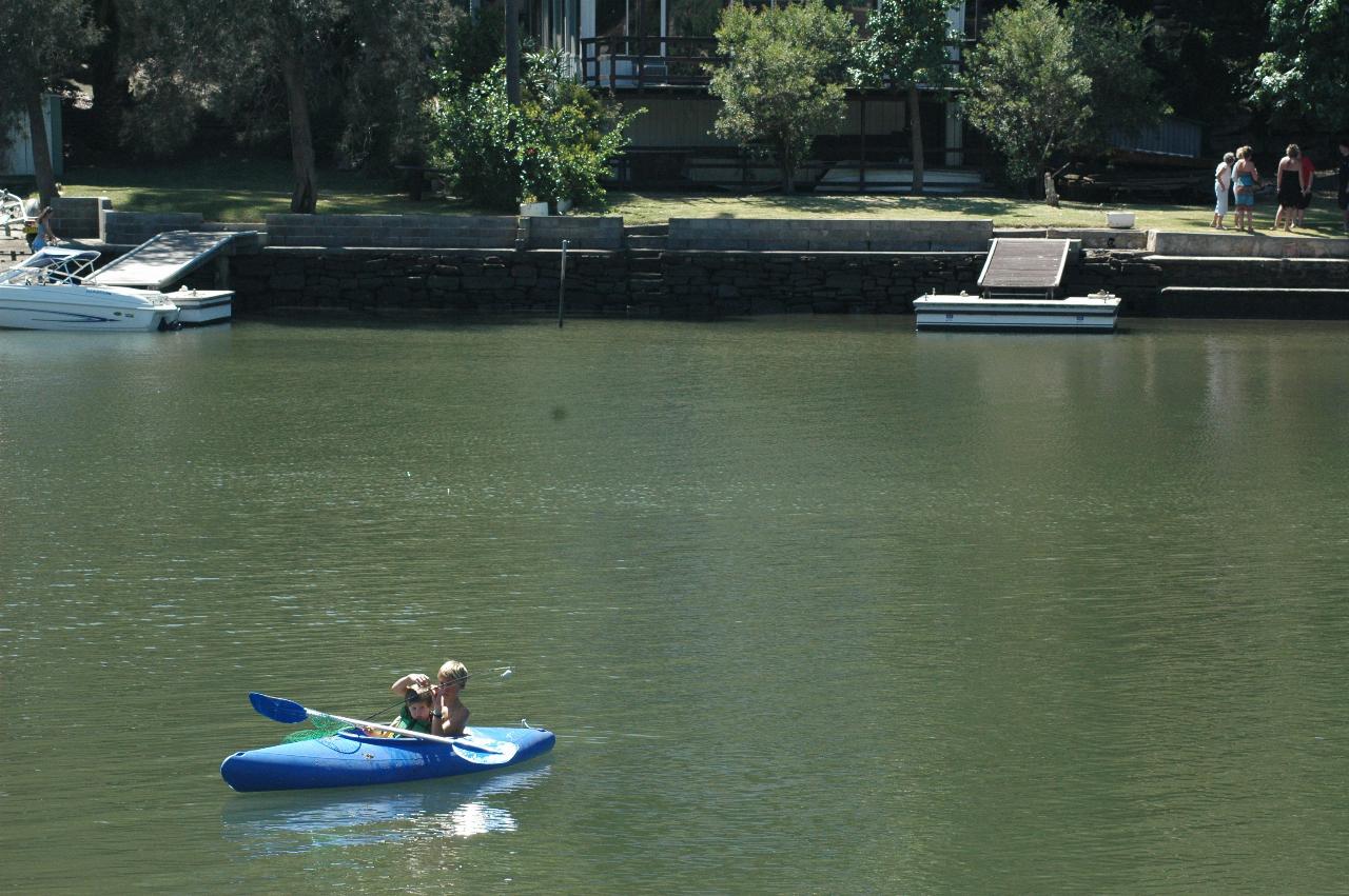 Dylan fishing, and taking Jake for a ride on Woronora River, Christmas morning