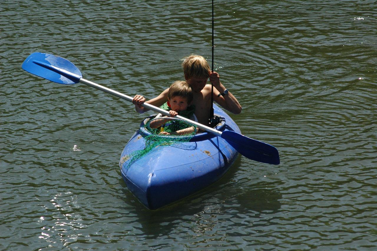 Dylan fishing, and taking Jake for a ride on Woronora River, Christmas morning