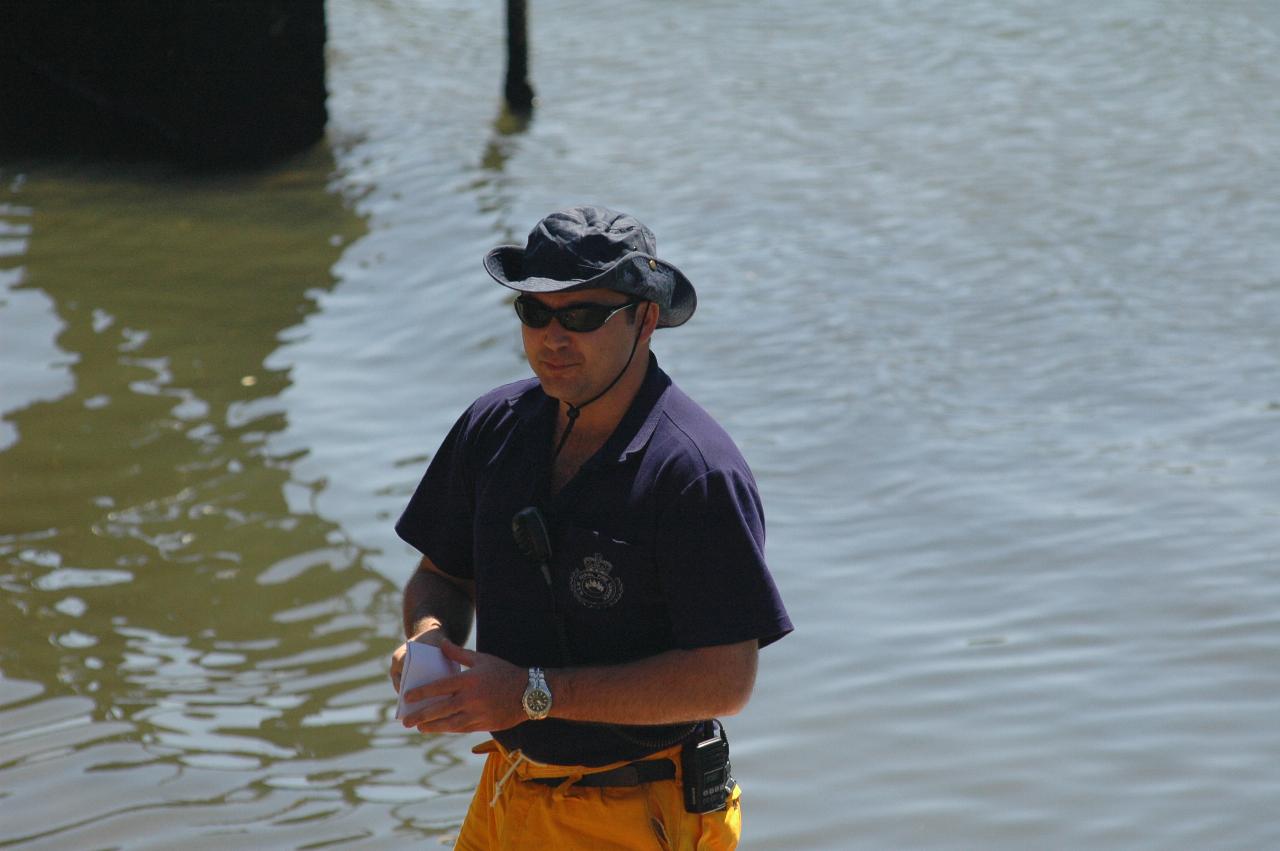 Peter Carter on Santa's boat talking to Cameron and Michelle and family on Woronora River on Christmas morning