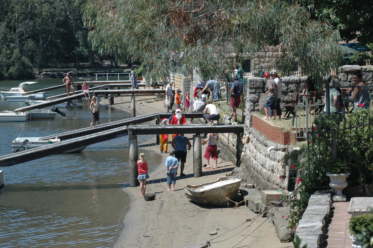 Santa coming down the beach on Woronora River on Christmas morning