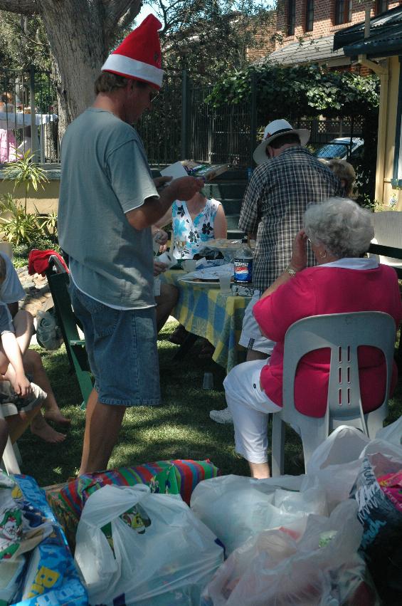 Distributing Christmas presents on Christmas morning at Cameron and Michelle's