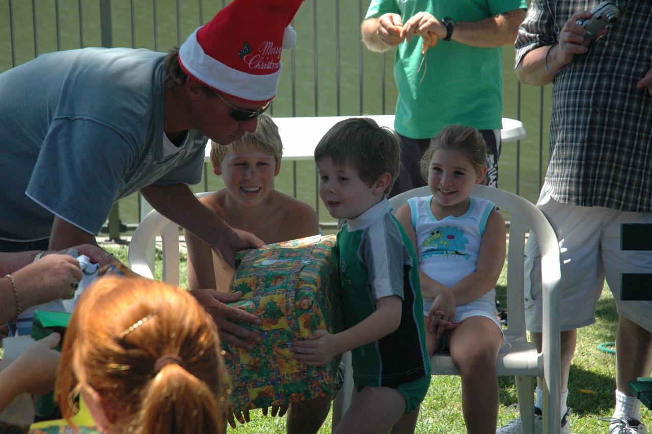 Distributing Christmas presents on Christmas morning at Cameron and Michelle's