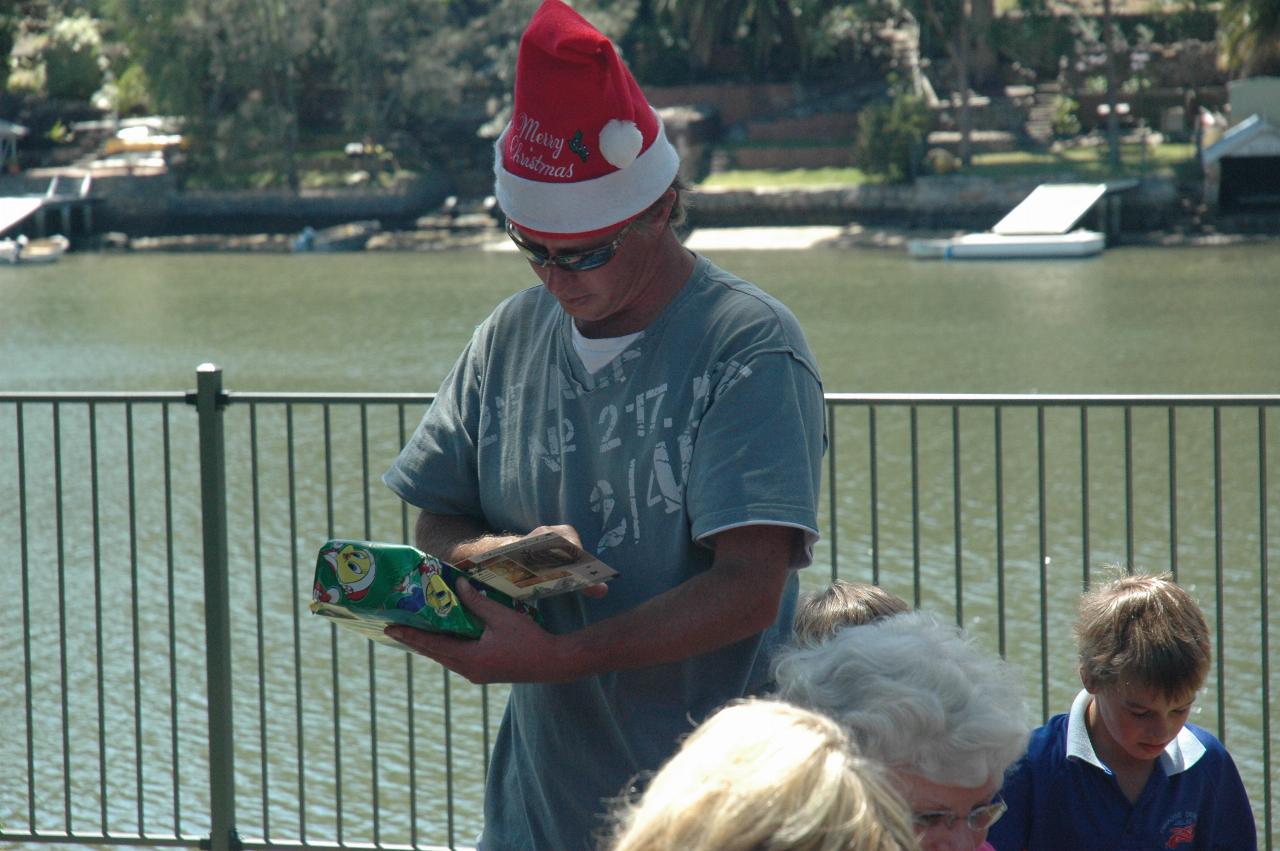 Distributing Christmas presents on Christmas morning at Cameron and Michelle's