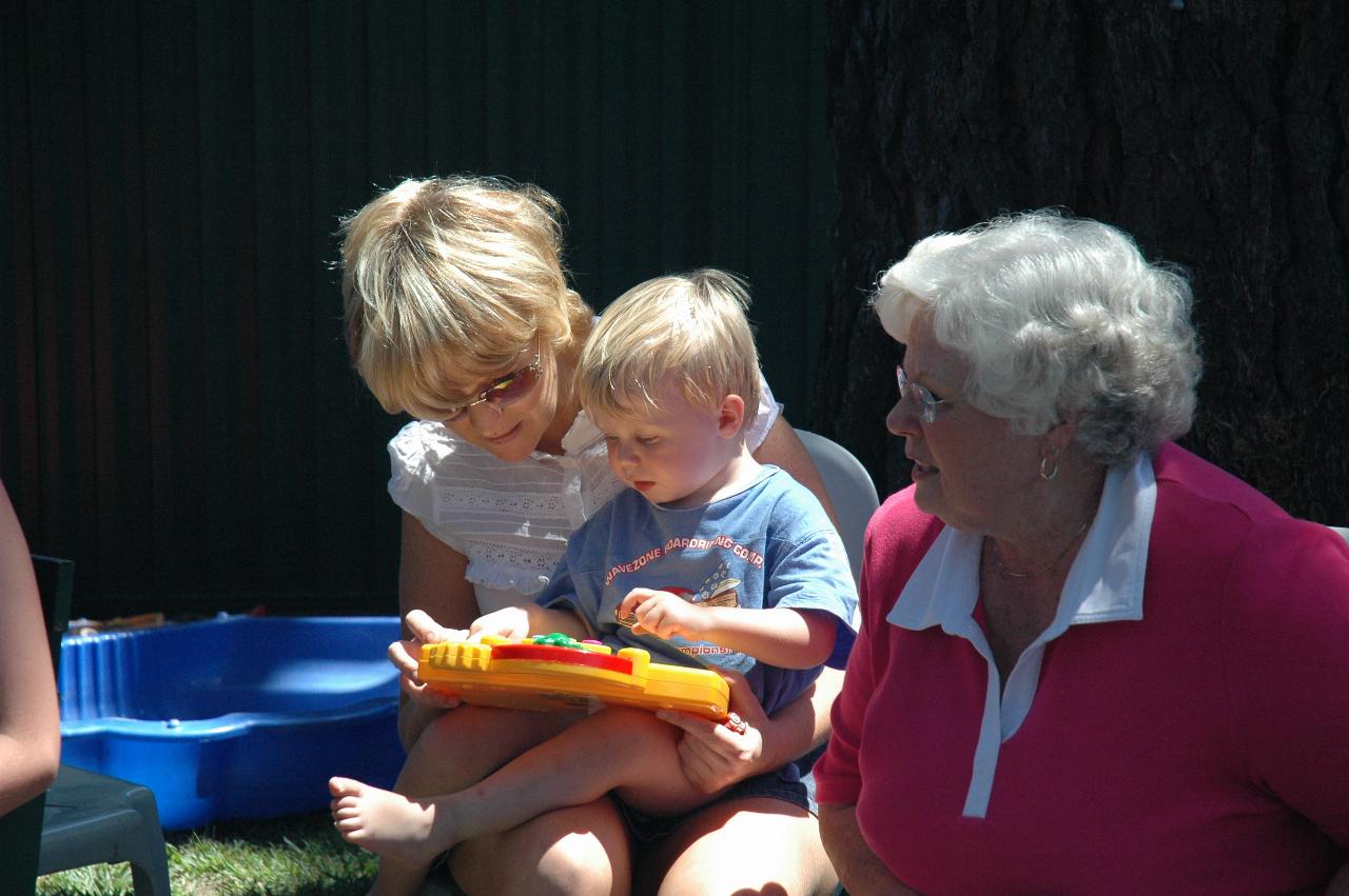 Michelle and Flynn with one of Flynn's presents, and Lorraine