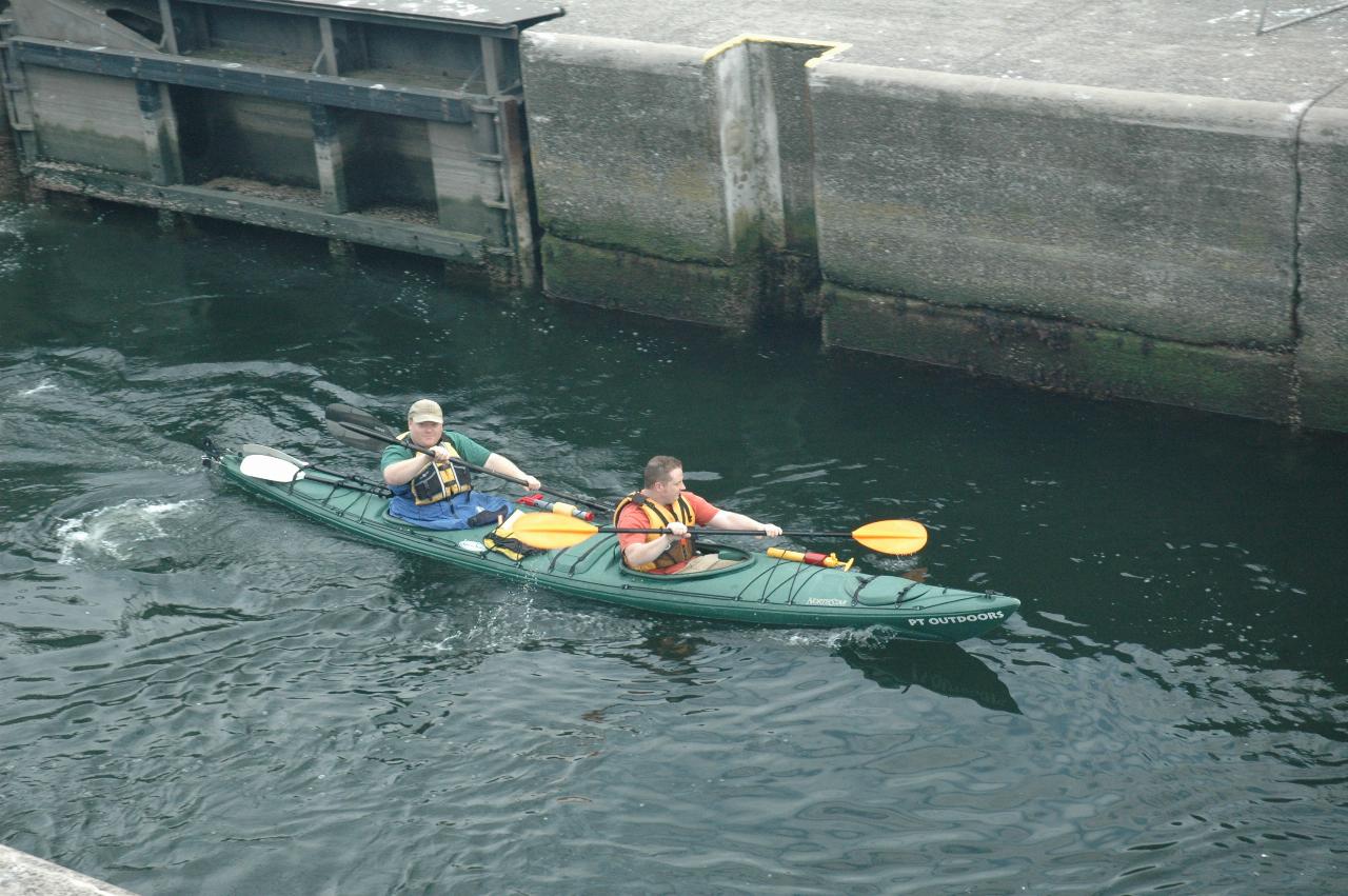 Canoeists on their way out of the smalller lock at Ballard Locks