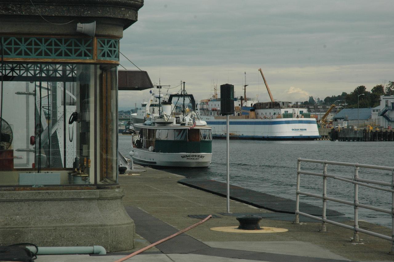 The wooden boat from earlier sailing out of Ballard Locks towards Lake Union