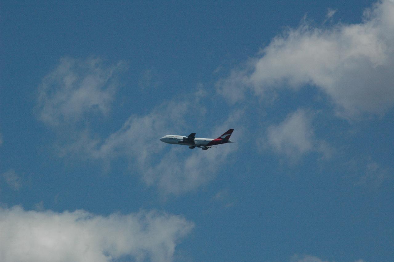 A Qantas 747 taking off from Mascot and crossing Kurnell peninsula