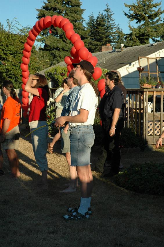 Seth concentrating on flying, with a crowd of onlookers