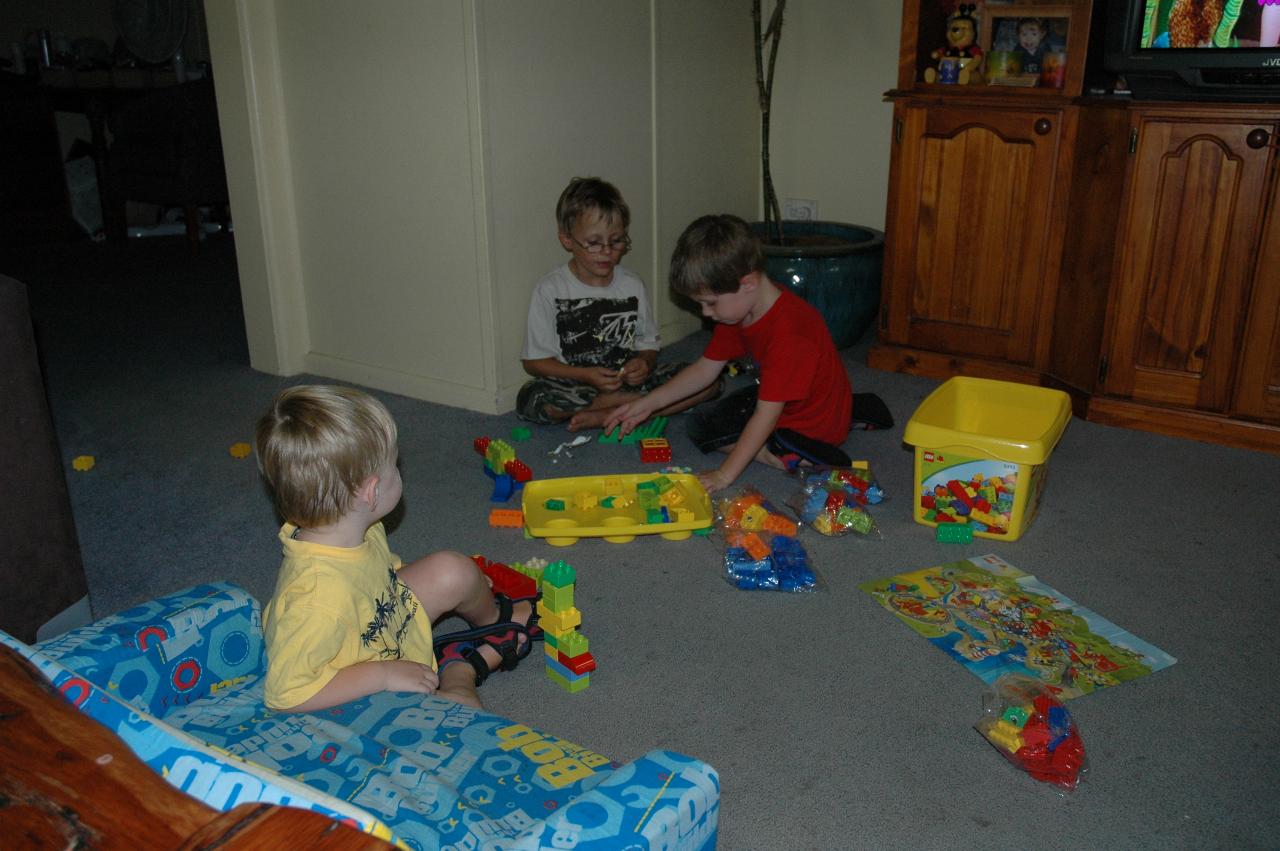 Flynn, with Tynan and Jake and Flynn's second birthday present