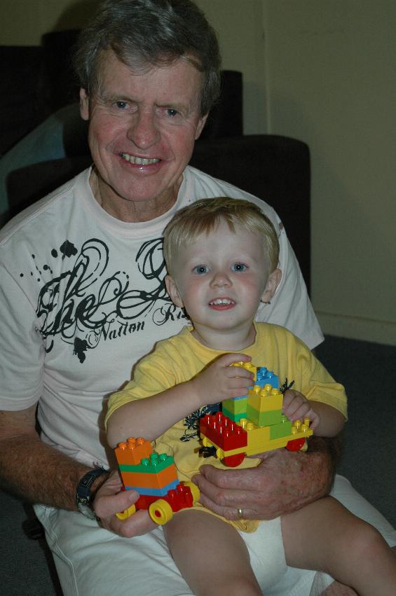 Flynn with blocks and Dandy at his second birthday party