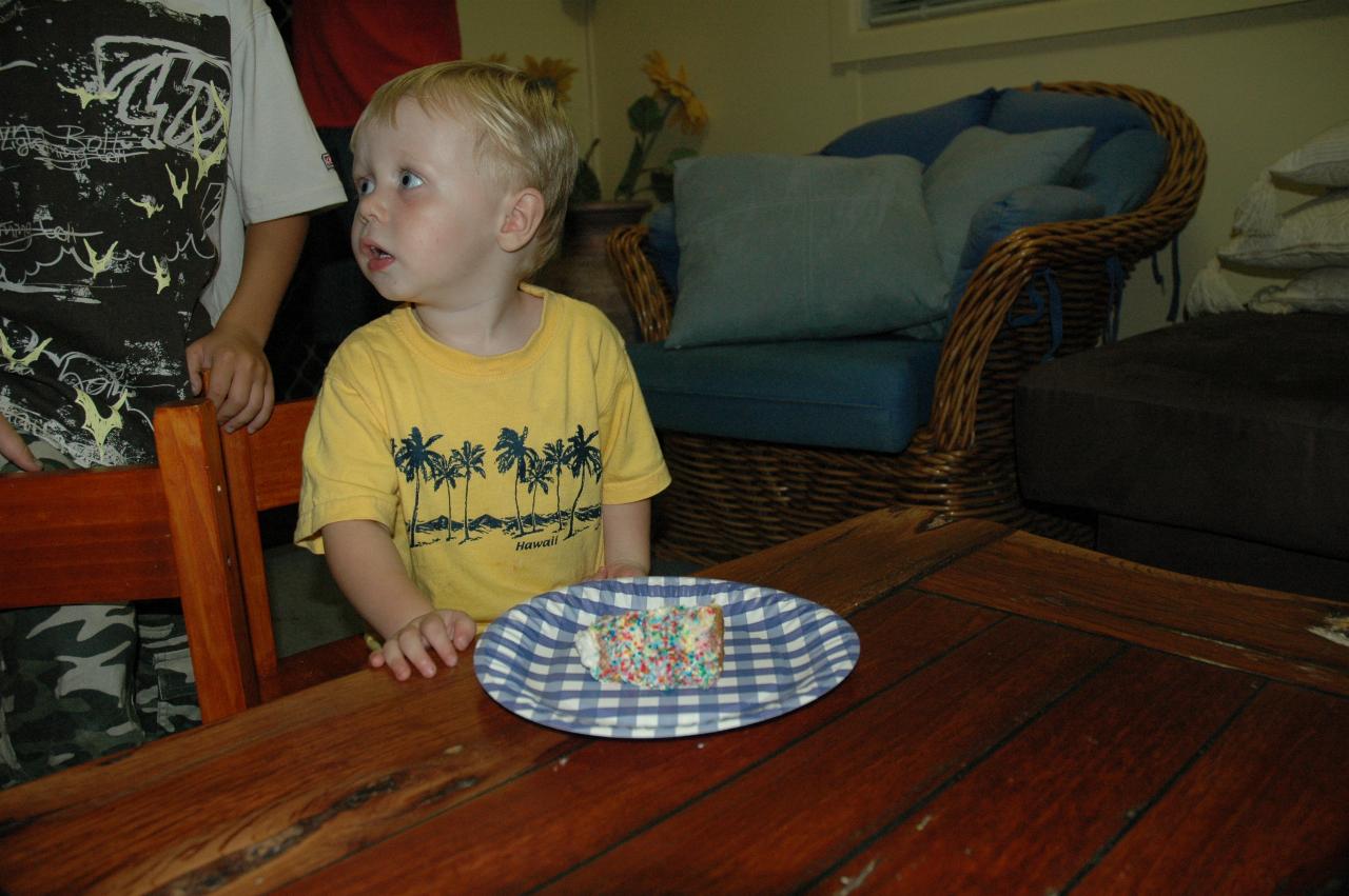 Flynn with a piece of birthday cake at his second birthday at Woronora