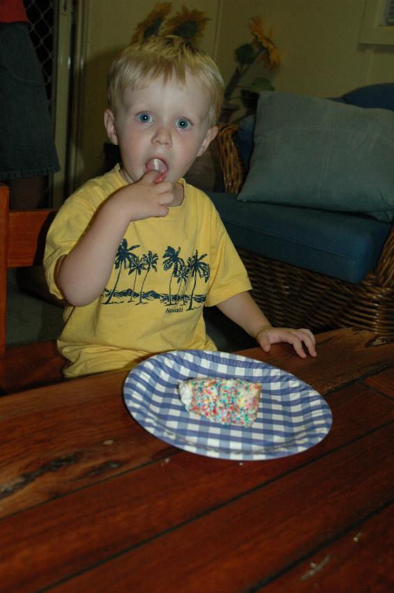 Gotta eat that cake slowly, thinks Flynn at his second birthday