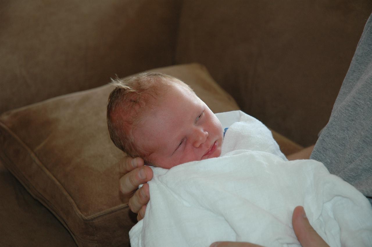 Cooper with mohawk in Glenn's arms