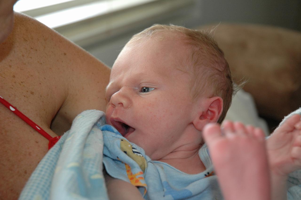 Little Cooper Wallace in his mum's arms