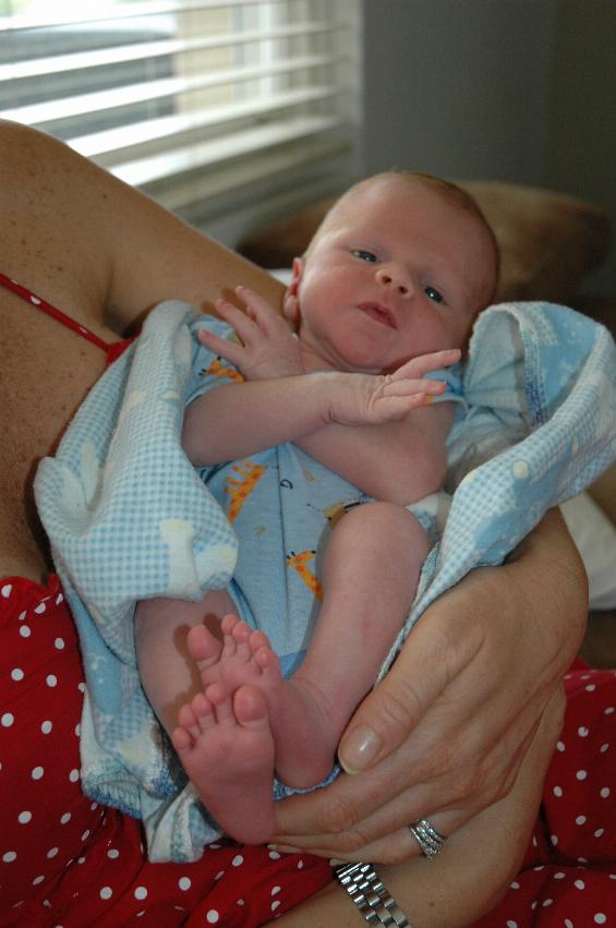 Little Cooper Wallace in his mum's arms