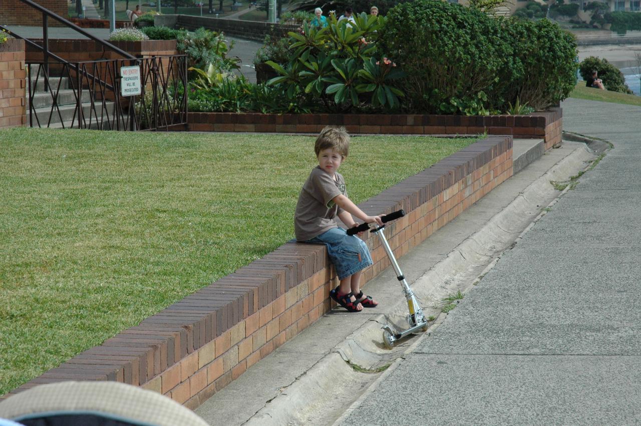 Jake Crofts waiting for us on The Esplanade, Cronulla during a walk