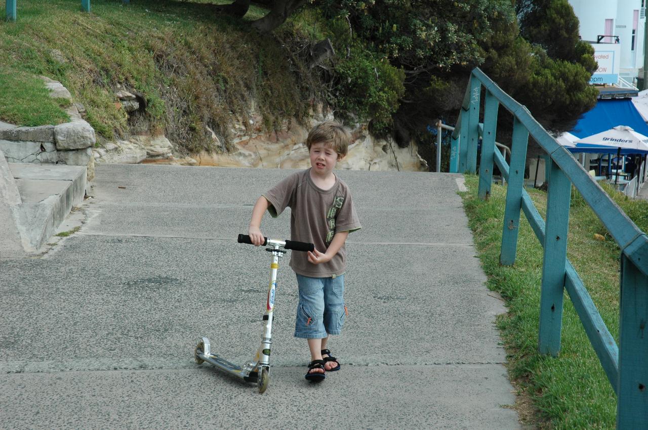 Jake Crofts waiting for us on The Esplanade, Cronulla during a walk