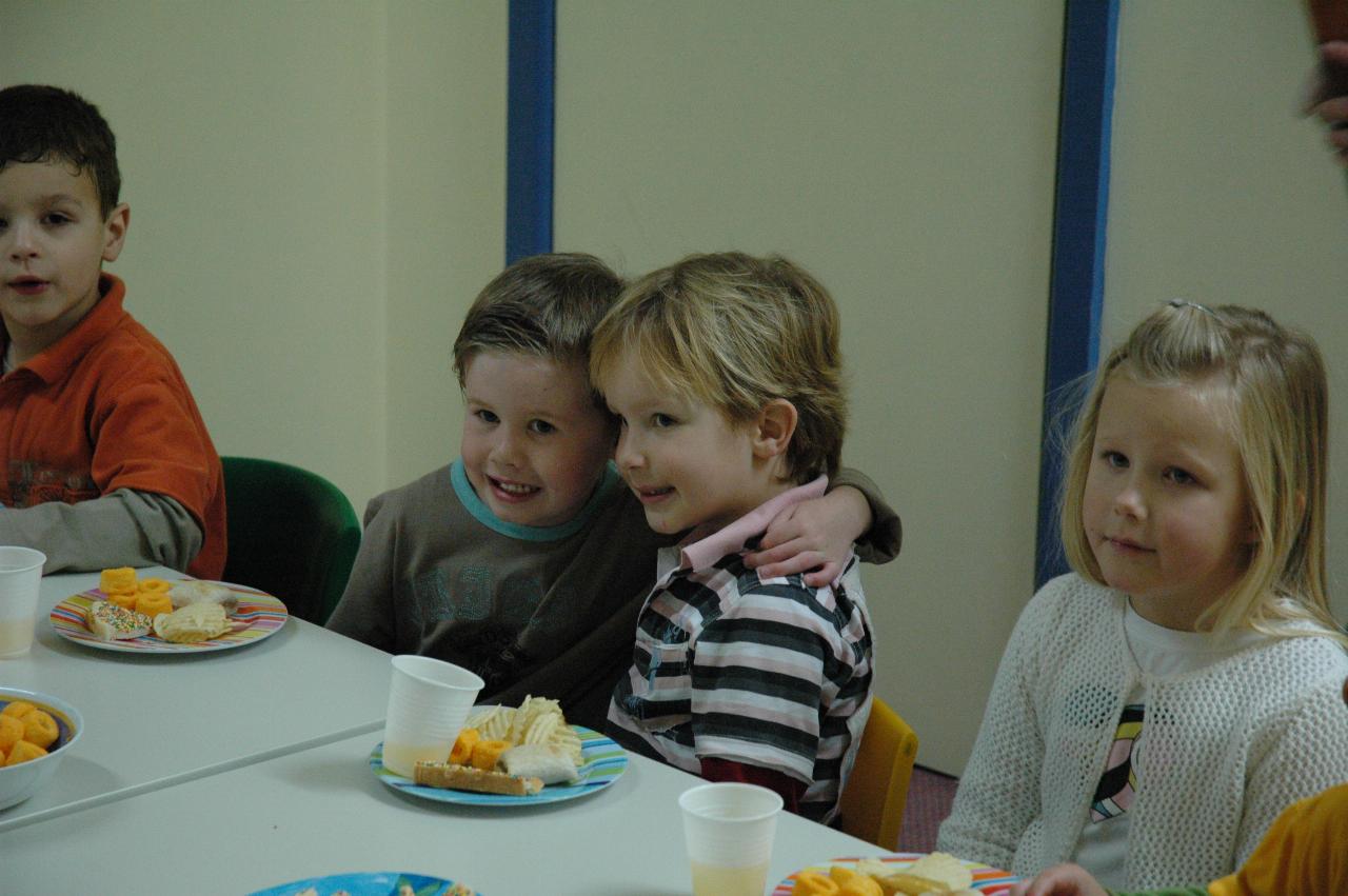 Jake's birthday at Crazy Maze: Jake and Riley at the feast