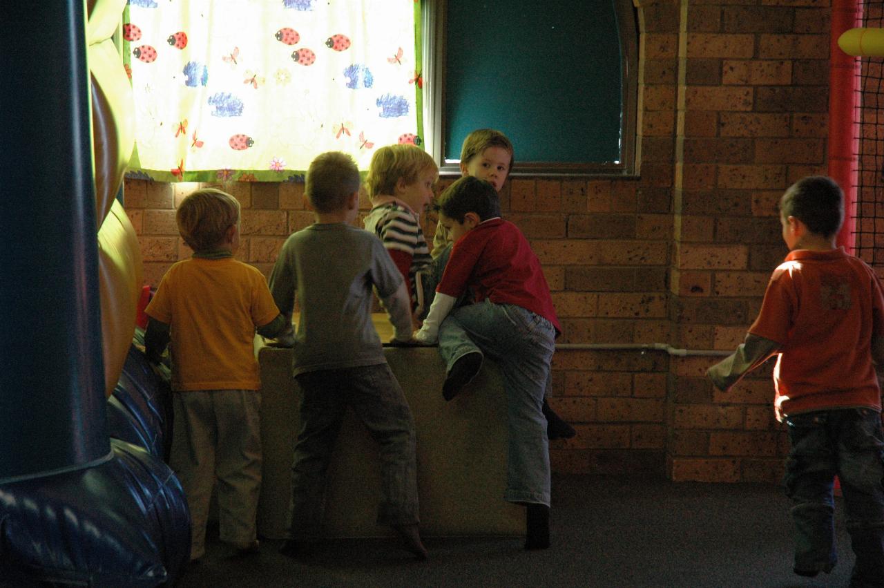 Jake's birthday at Crazy Maze: climbing onto the box