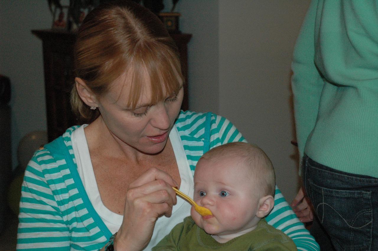 Jake's 5th birthday (Illawong): Kelly feeding Cooper