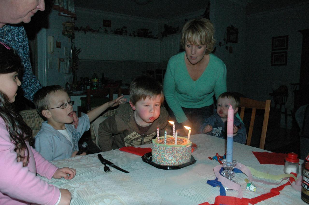 Jake's 5th birthday (Illawong): Jake blowing the candles out