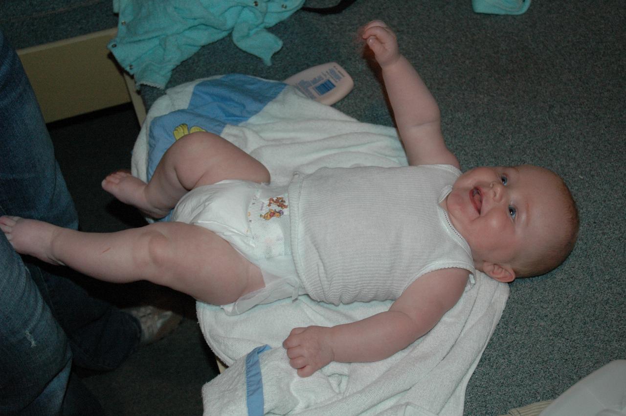 Kelly and Baby Cooper free on the bed after his bath, at Bendalong for his Baptism