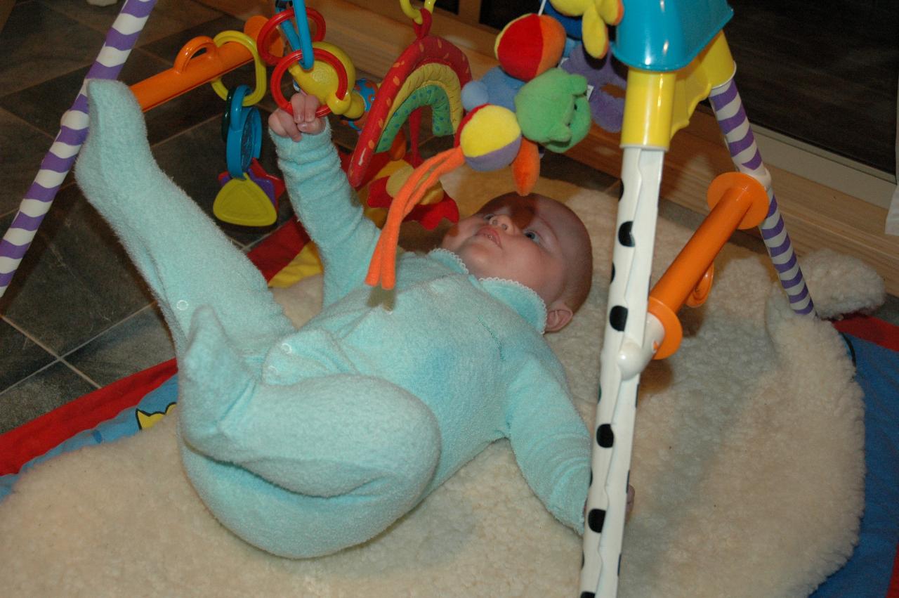 Baby Cooper on the floor at Bendalong for his Baptism weekend