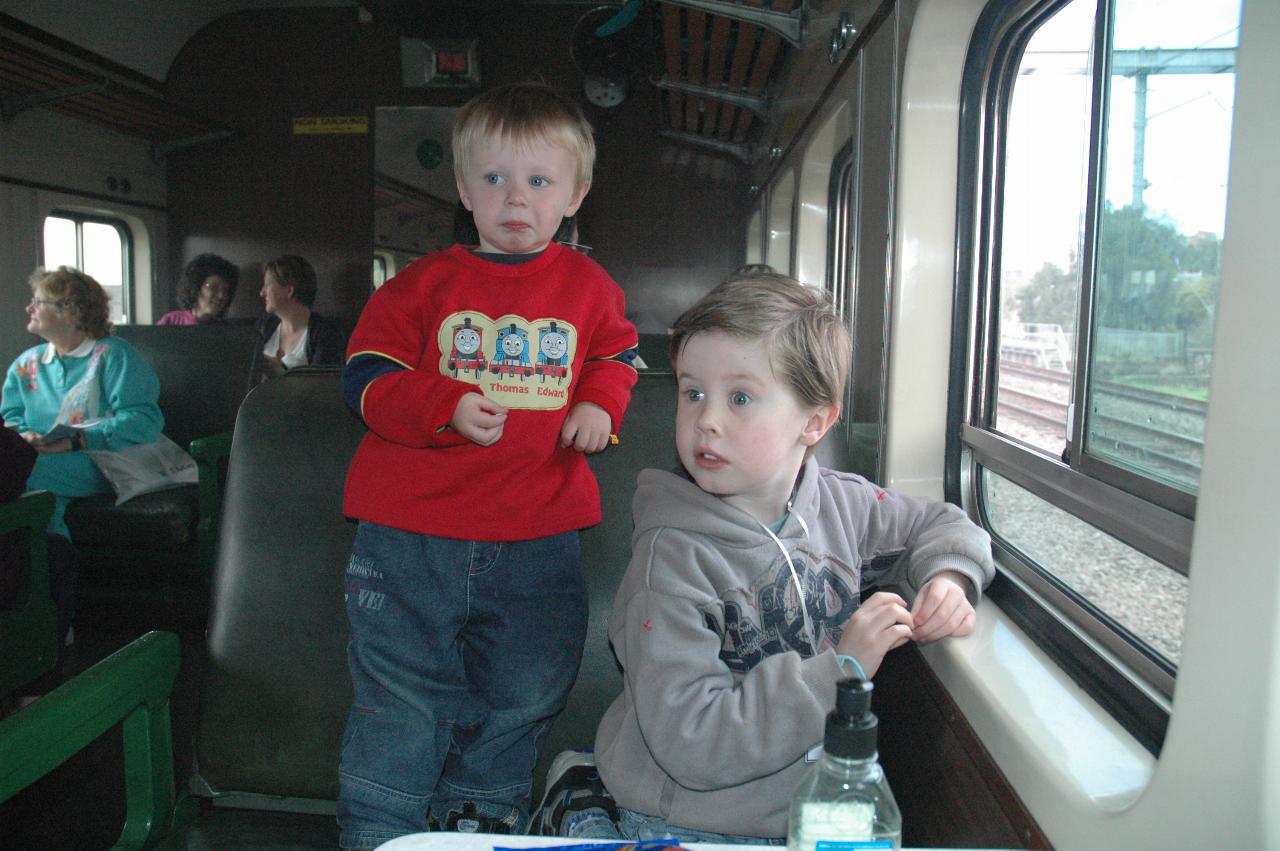 Flynn and Jake on steam train ride for Central's 100th anniversary