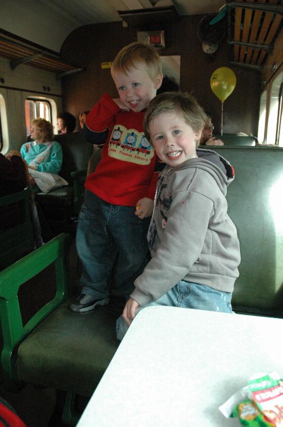 Flynn and Jake on steam train ride for Central's 100th anniversary