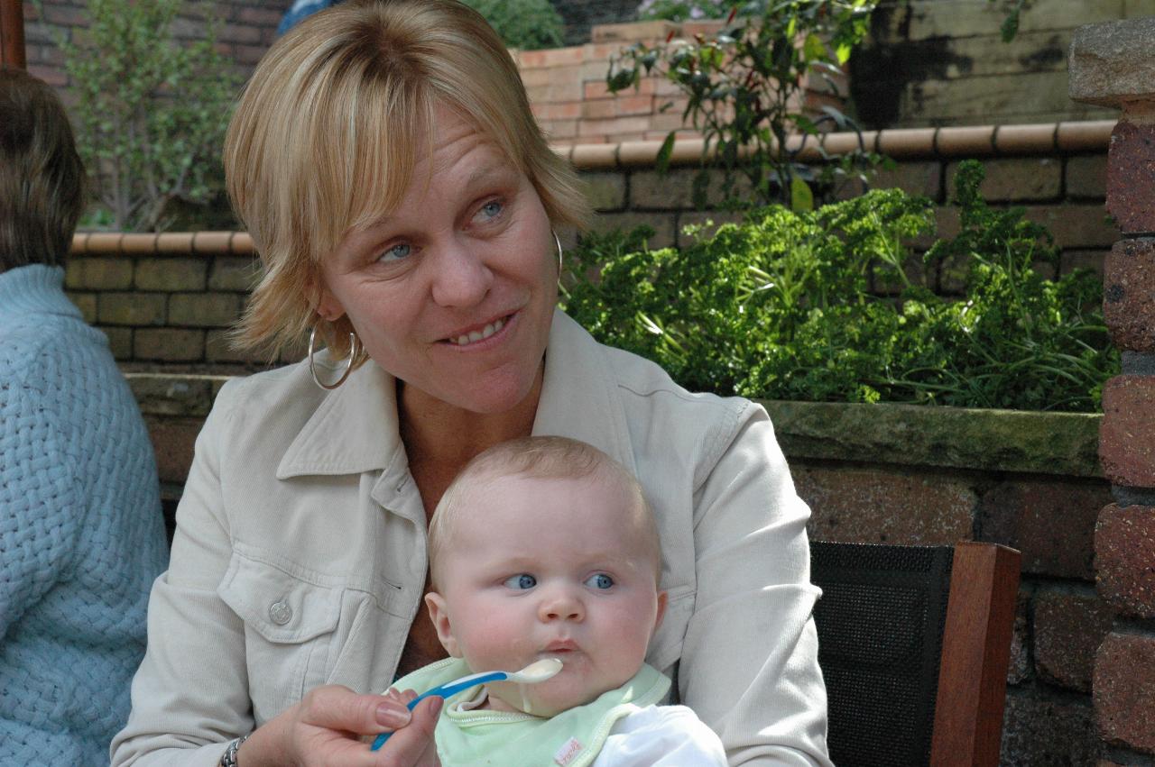 Kelly feeding baby Cooper at Currey's, Engadine; Yvonne on left