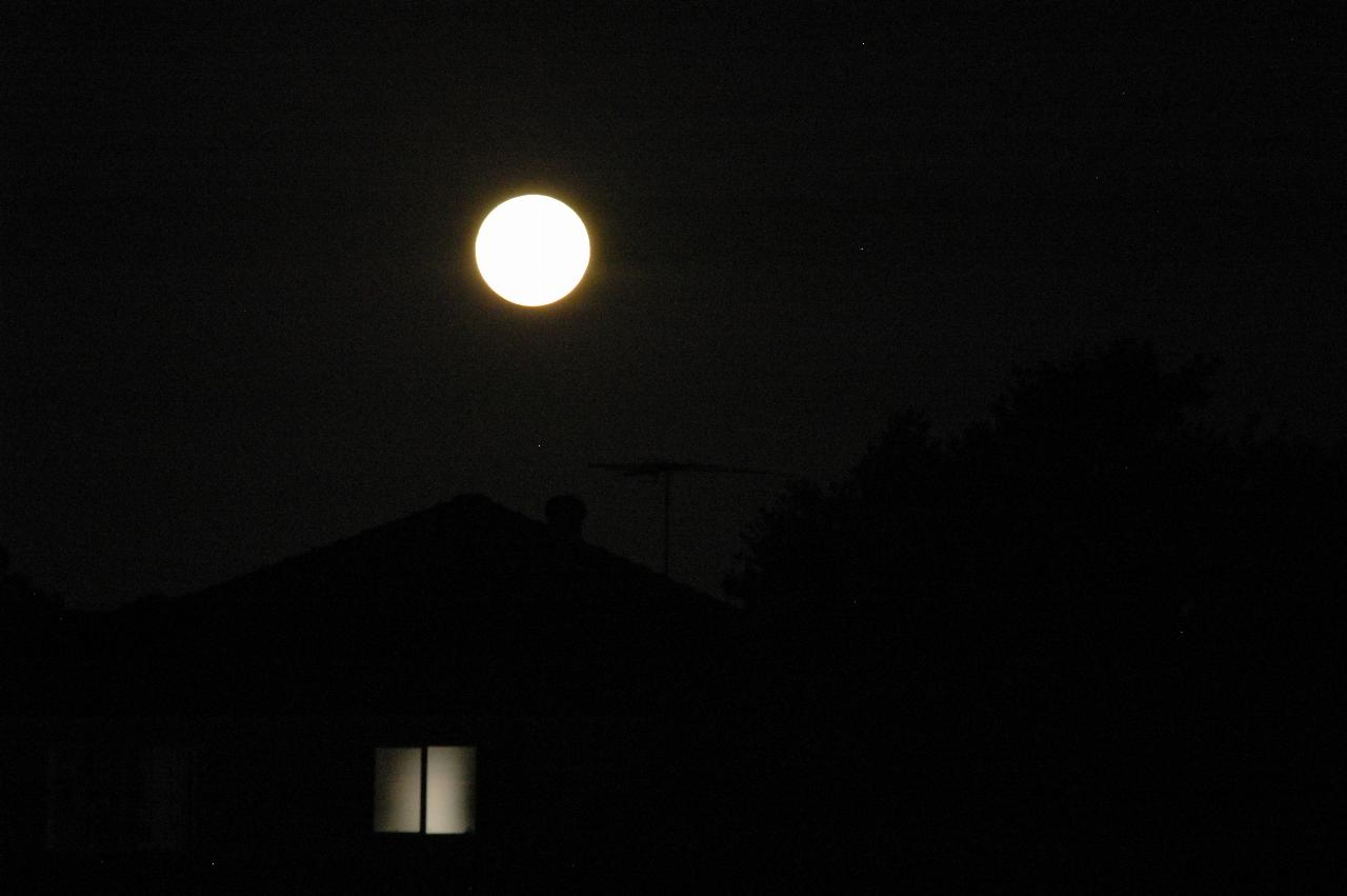 Moon rise over Padstow.  Full moon at apogee; nearby house some photos