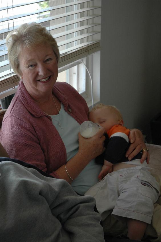 Yvonne feeding an almost asleep Cooper at Kelly & Glenn's, Cronulla