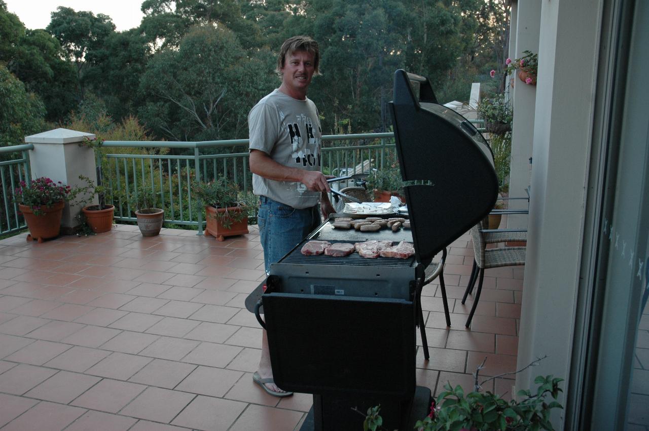 Cameron doing chef duty at Michelle's birthday at Illawong