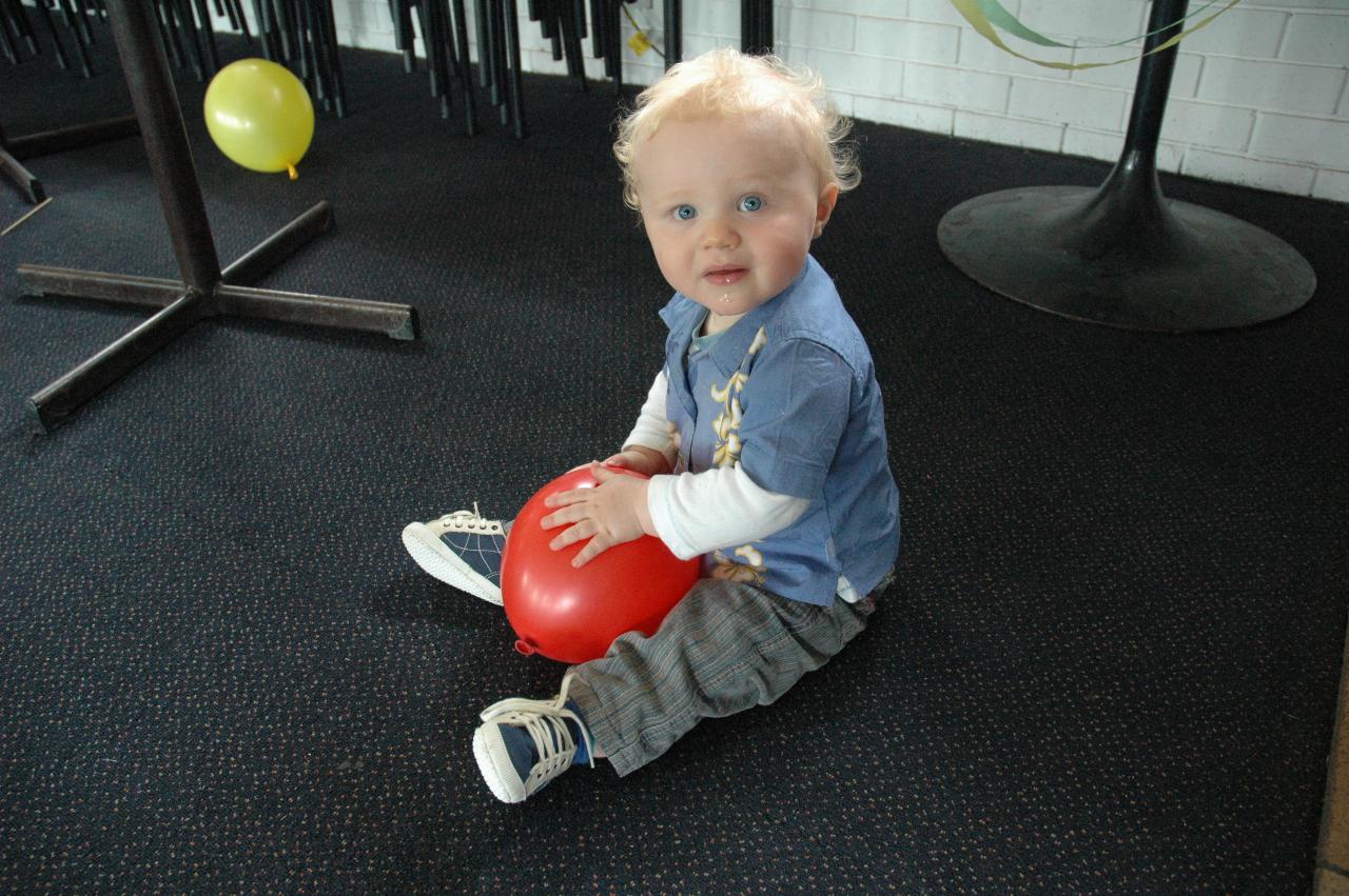 Tynan's 7th birthday party: Cooper Wallace with balloon