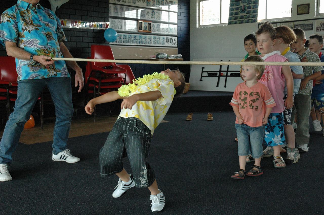 Tynan's 7th birthday party: Tynan doing the Limbo Rock