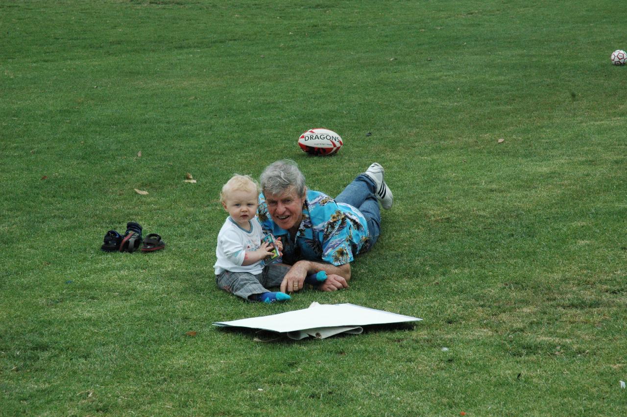 Tynan's 7th birthday party: Peter with Cooper on the playing field