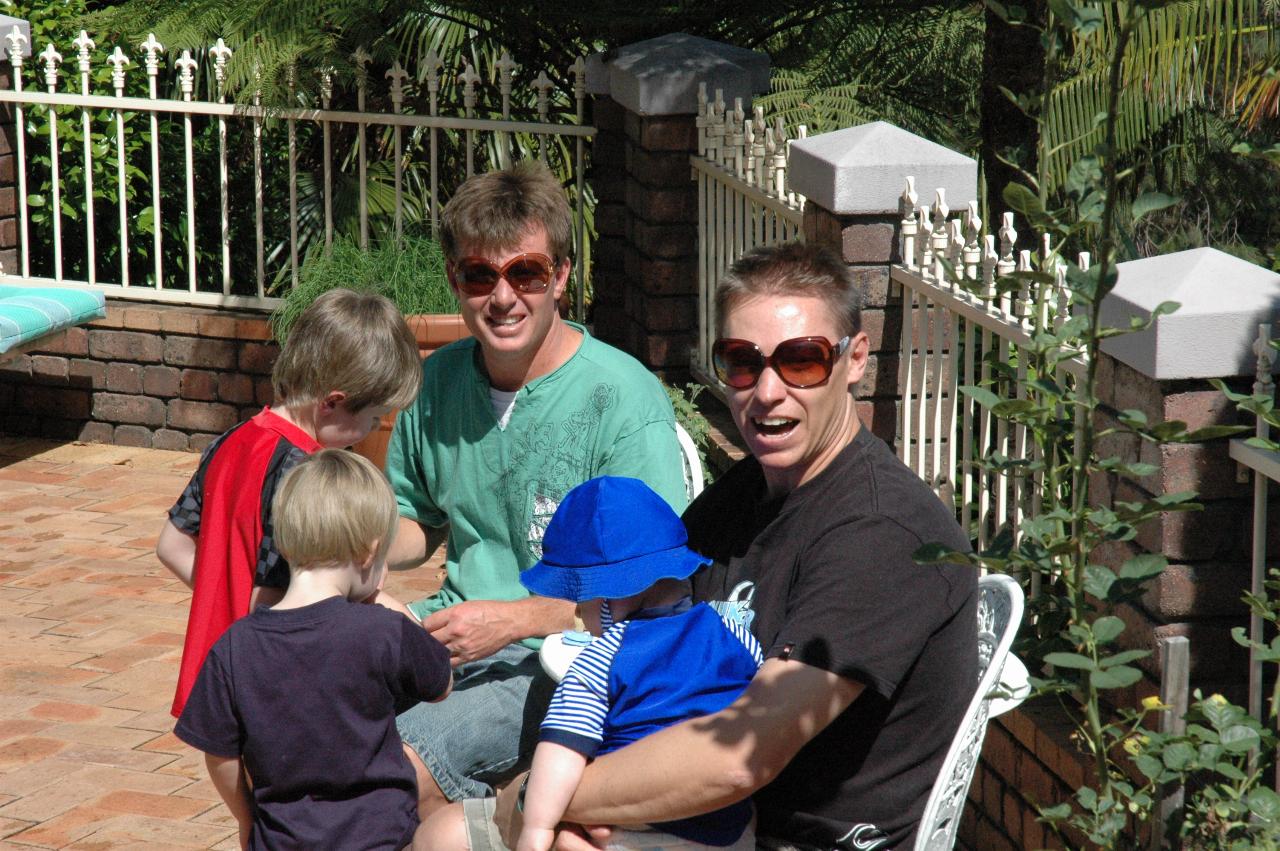 Christmas at Currey's: Around the pool: Jake, Flynn, Cameron (big glasses) and Glenn (big glasses) with Cooper