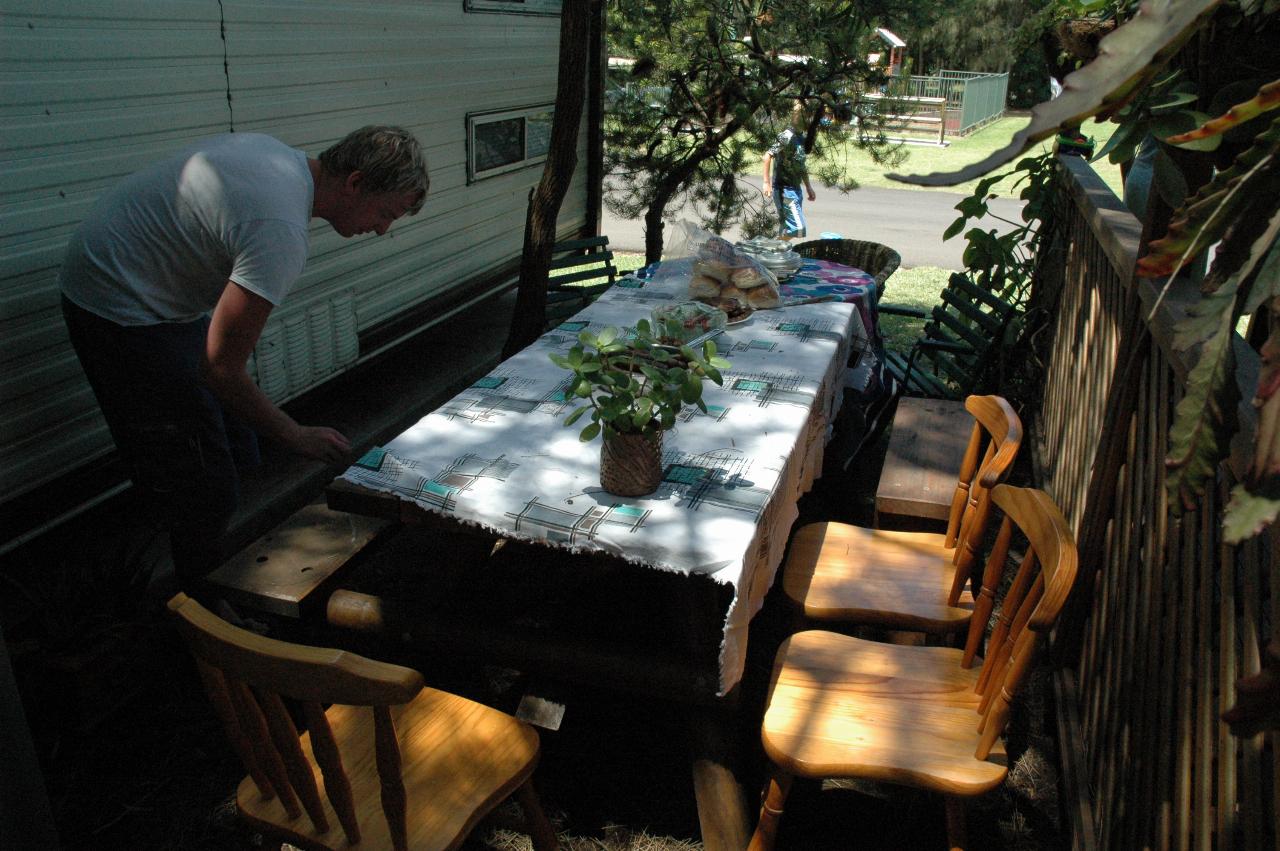 Keiran setting up table at Bendalong