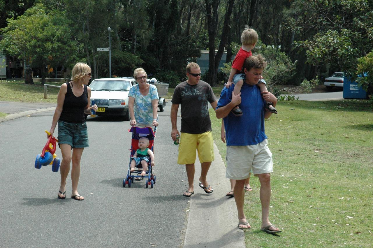 Bendalong afternoon walk: Kelly, Yvonne with Cooper, Craig, and Cameron with Flynn