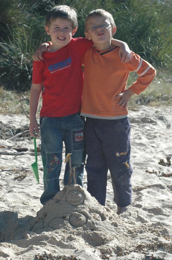 Jake and Tynan with their sand castle at Boat Harbour Beach, Bendalong