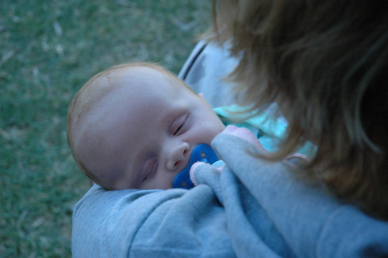 Sleepy Cooper Wallace in Michelle's arms at Bendalong