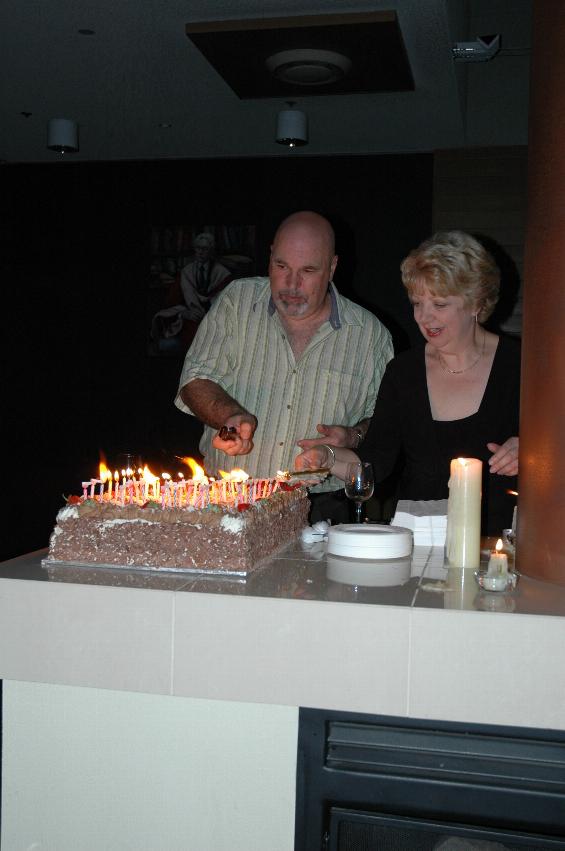 Peter and Sarah lighting the candles on his cake