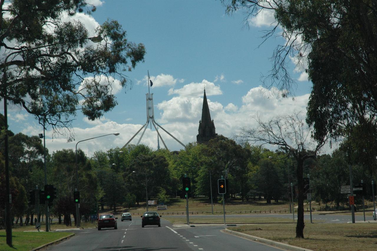 Parliament House flag pole and St. Mark's Cathedral spire, from Canberra Avenue